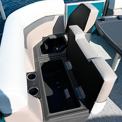 Open storage compartments beneath seating in the rear cockpit of a pontoon boat (2026 Princecraft Vectra 21 RL), viewed from above.