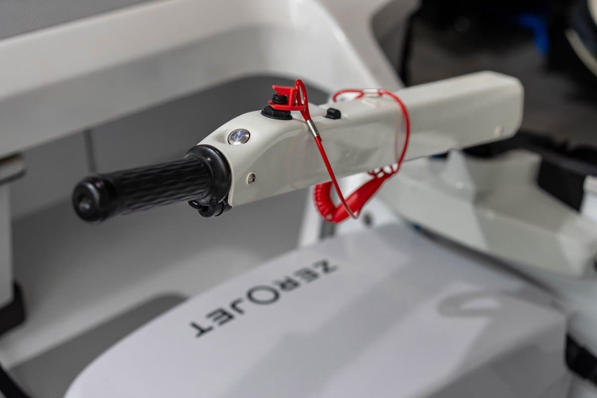 Offshore Cruising Tenders OC330 with ZeroJet tiller handle and safety lanyard, close-up from the side