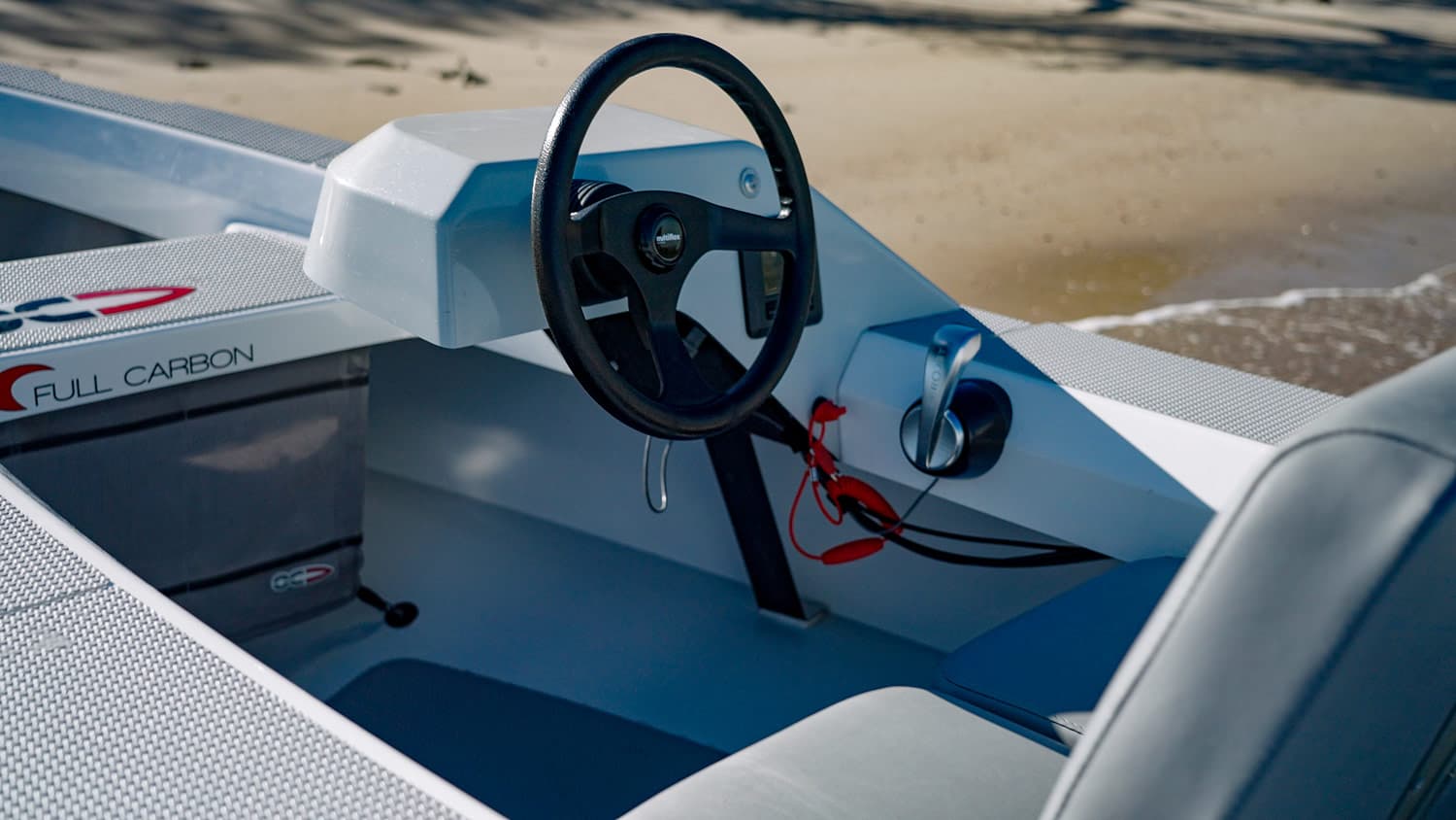Helm and cockpit of the Offshore Cruising Tenders OC330, viewed from the aft side.