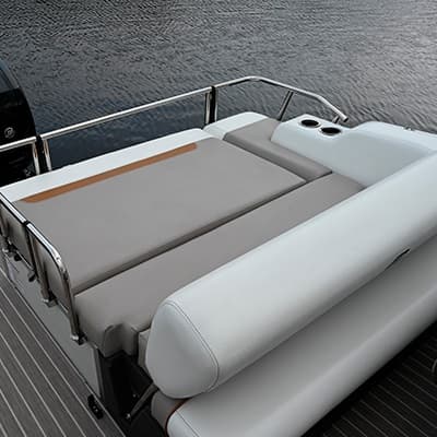 Rear lounge and sun pad of a pontoon boat (2026 Princecraft Vectra 21 RL), viewed from above at the stern.