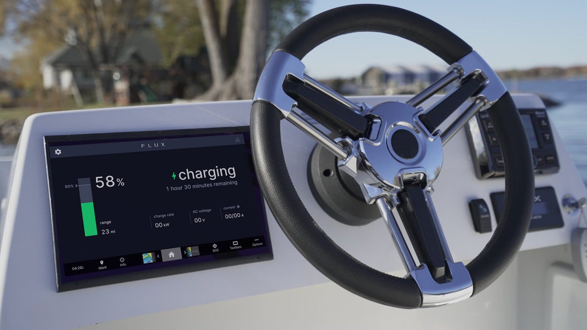 Flux Marine GFX Stealth helm with steering wheel and dashboard display showing charging status, viewed from the cockpit.