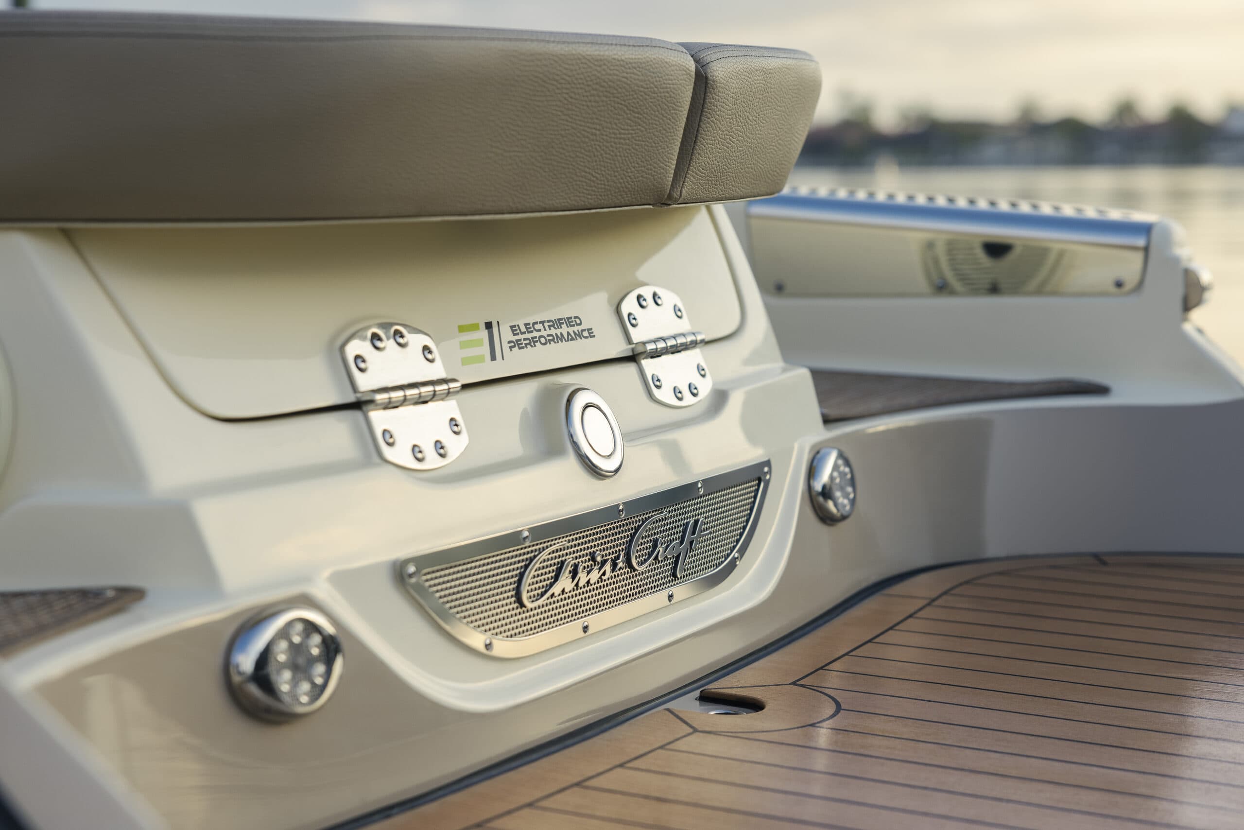 Chris Craft Launch 25 GTe EVOA stern seating detail and branded speaker, viewed close-up from the swim platform.