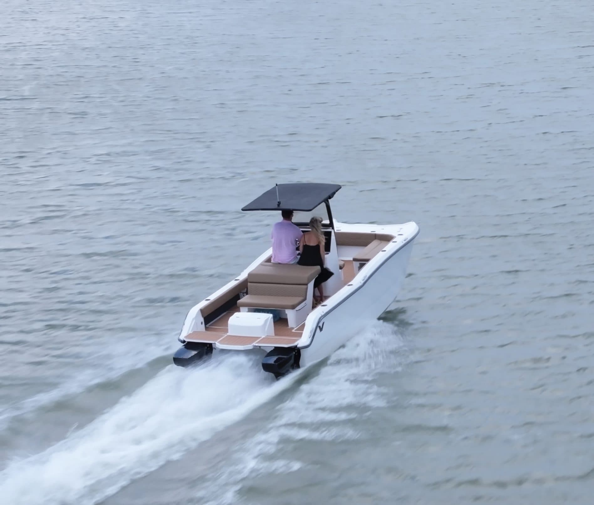 white center console making wake in water