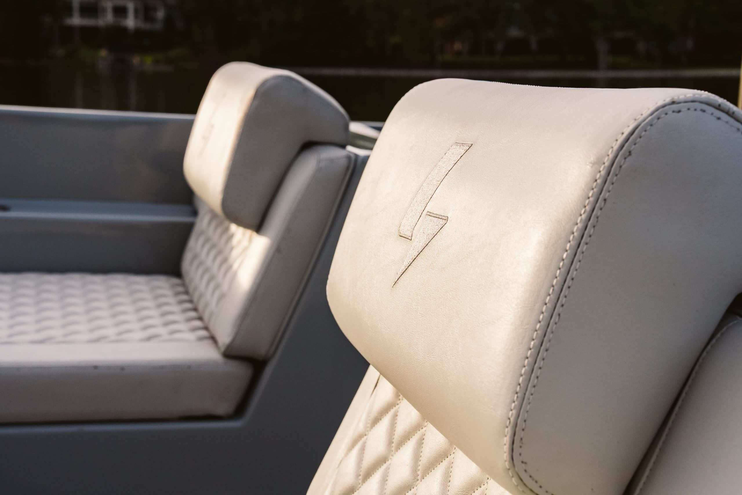 Halevai model2050 seating detail, showing a padded headrest and quilted seat upholstery from the side.