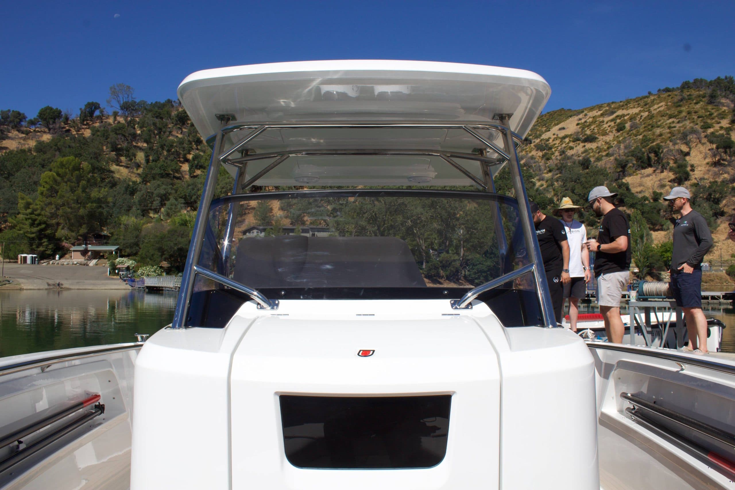 Sterk 31E bow deck and windshield viewed from the front, with the canopy overhead.