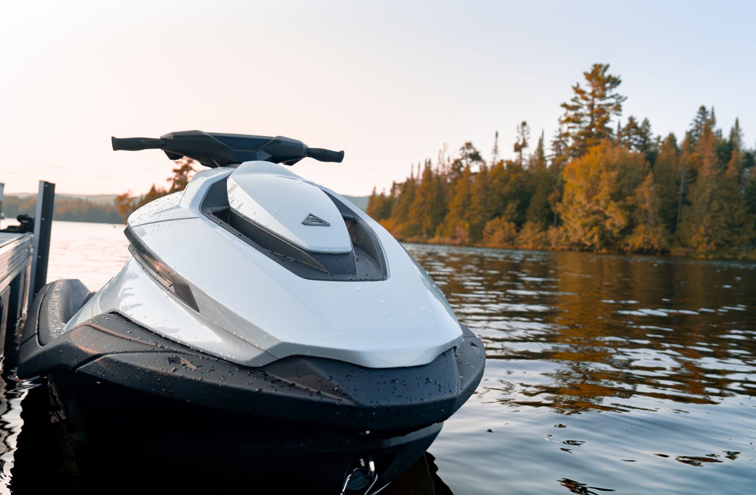 Taiga Orca P2 personal watercraft viewed from the front at a dock, with the bow and handlebars visible.