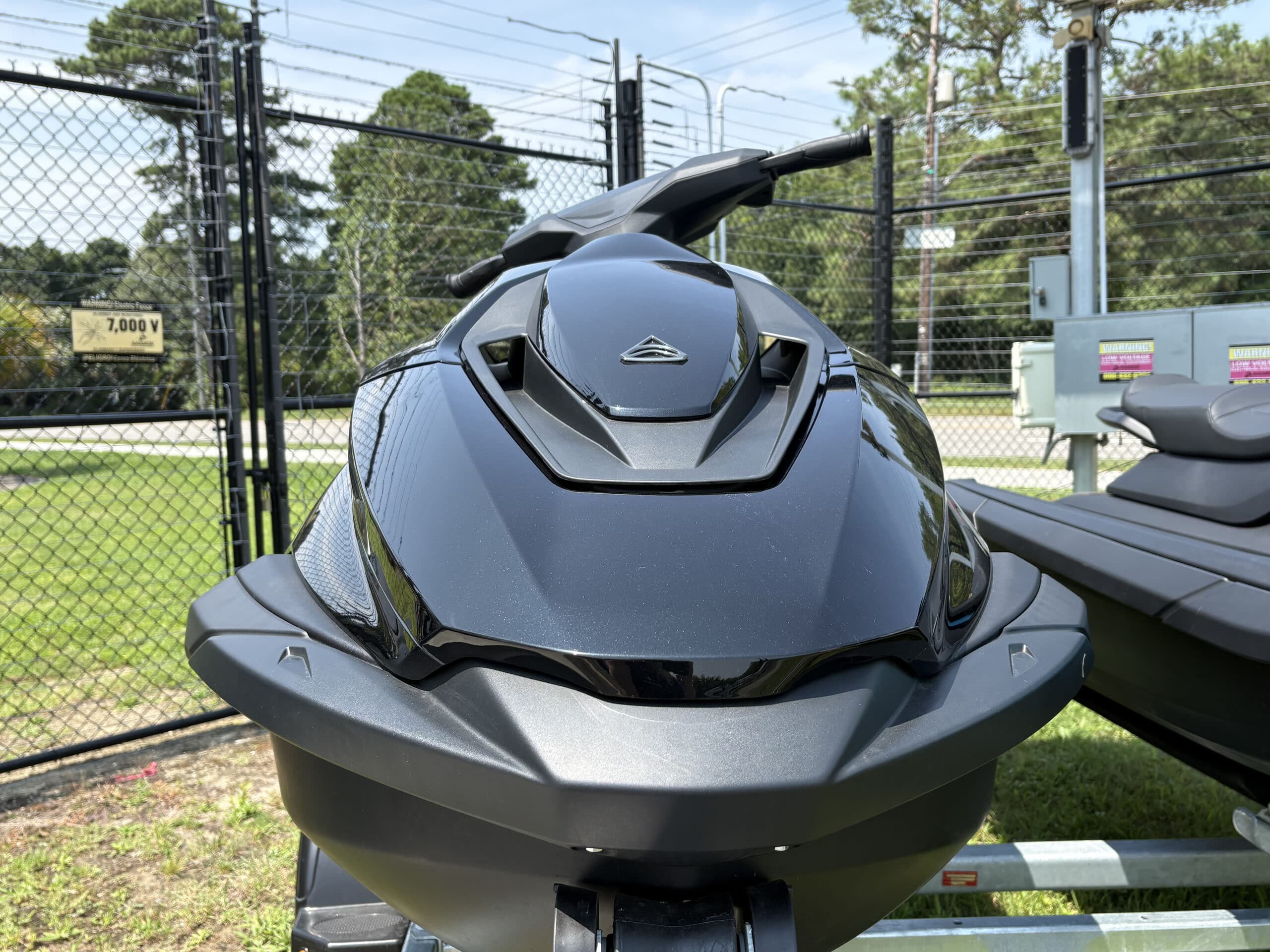 Front view of a Taiga Orca personal watercraft, showing the bow, handlebars, and upper hull.