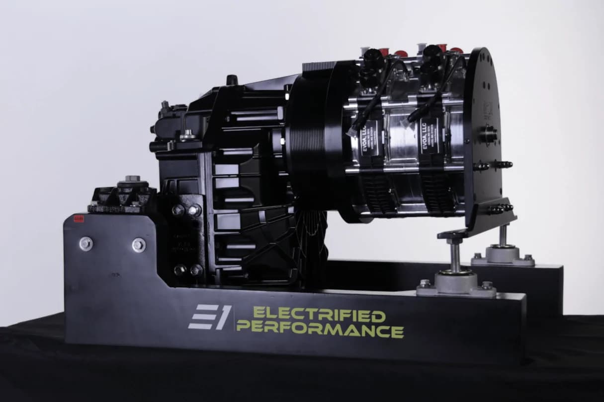 Chris Craft Launch 25 GTe EVOA Electrified Performance marine propulsion system displayed on a stand; no boat visible.