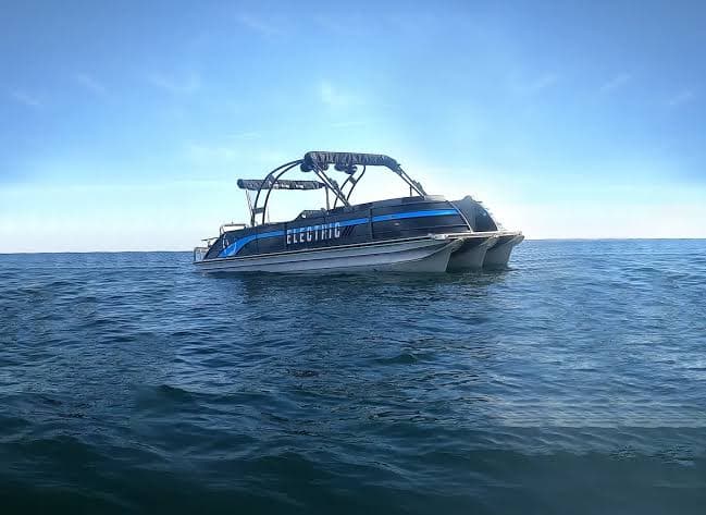 Vision Marine V30 viewed from the side on open water, with “ELECTRIC” visible on the hull.